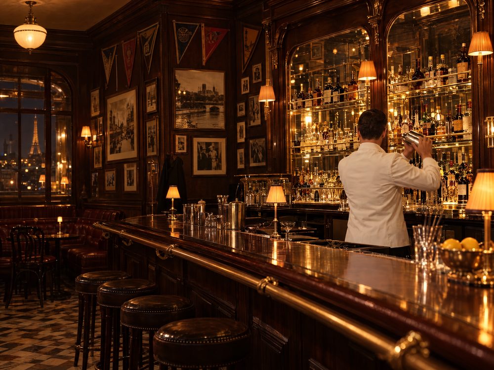 A classic 1920s Paris bar with dark wood and warm light
